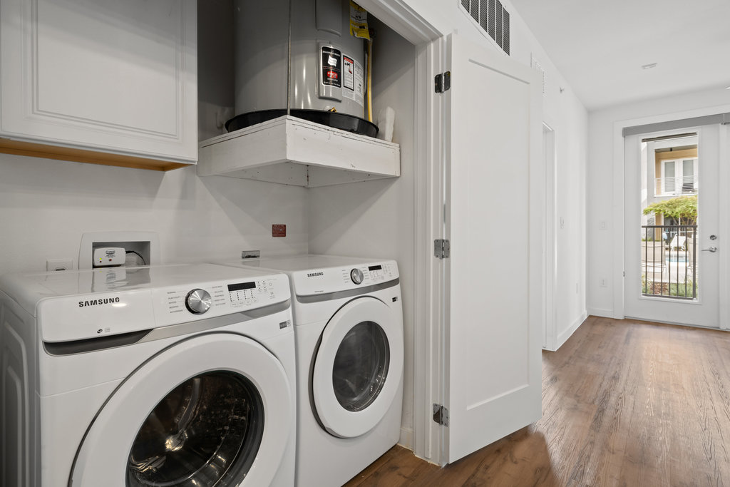 4801 Springdale Road, Unit 1106 Austin, TX 78723 - Photo 9 of 40 a view of entryway with washer and dryer