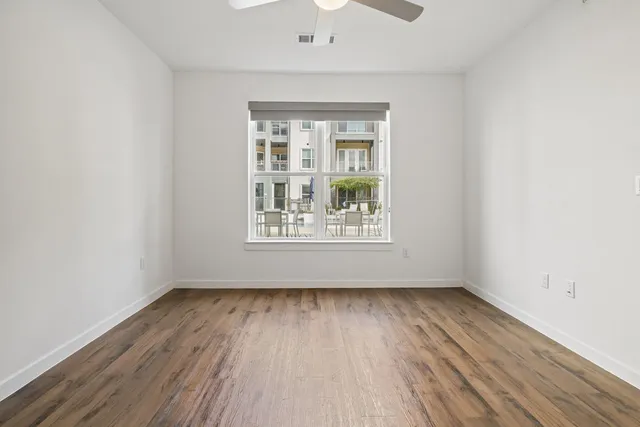 a view of gallery with windows