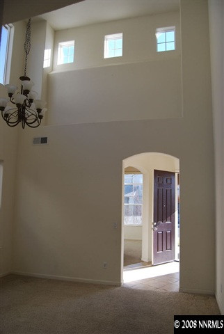 9345 Hummer Court Reno, NV 89521 - Photo 7 of 9 a view of a hallway with a small space