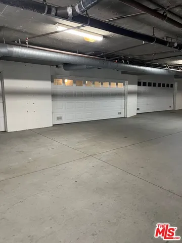 a bathroom with a shower and a toilet