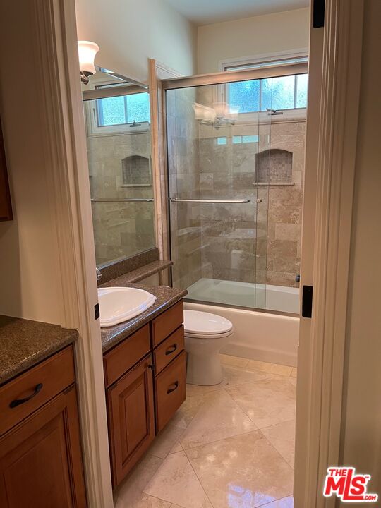 11357 Ovada Place, Unit 2 Los Angeles, CA 90049 - Photo 13 of 13 a bathroom with a shower and a toilet