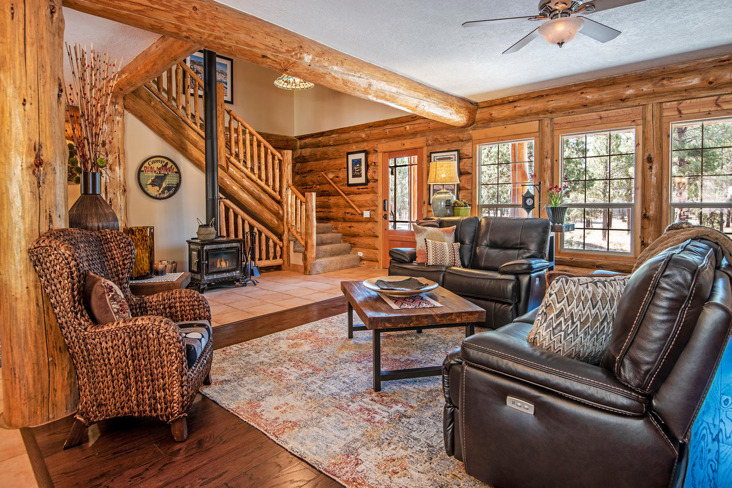 16700 Fair Mile Road Sisters, OR 97759 - Photo 10 of 60 Log Home with Log Staircase and Wood Stove. Also has Furnace & Heat Pump for Heat & A/C.