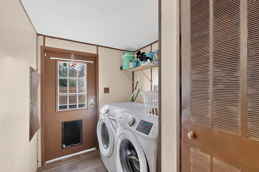 7219 Rucker Street Azle, TX 76020 - Photo 14 of 16 a utility room with dryer and washer
