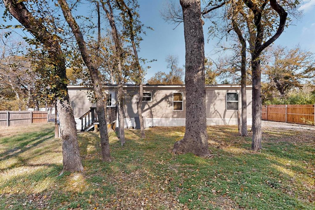 7219 Rucker Street Azle, TX 76020 - Photo 15 of 16 a view of outdoor space with garden