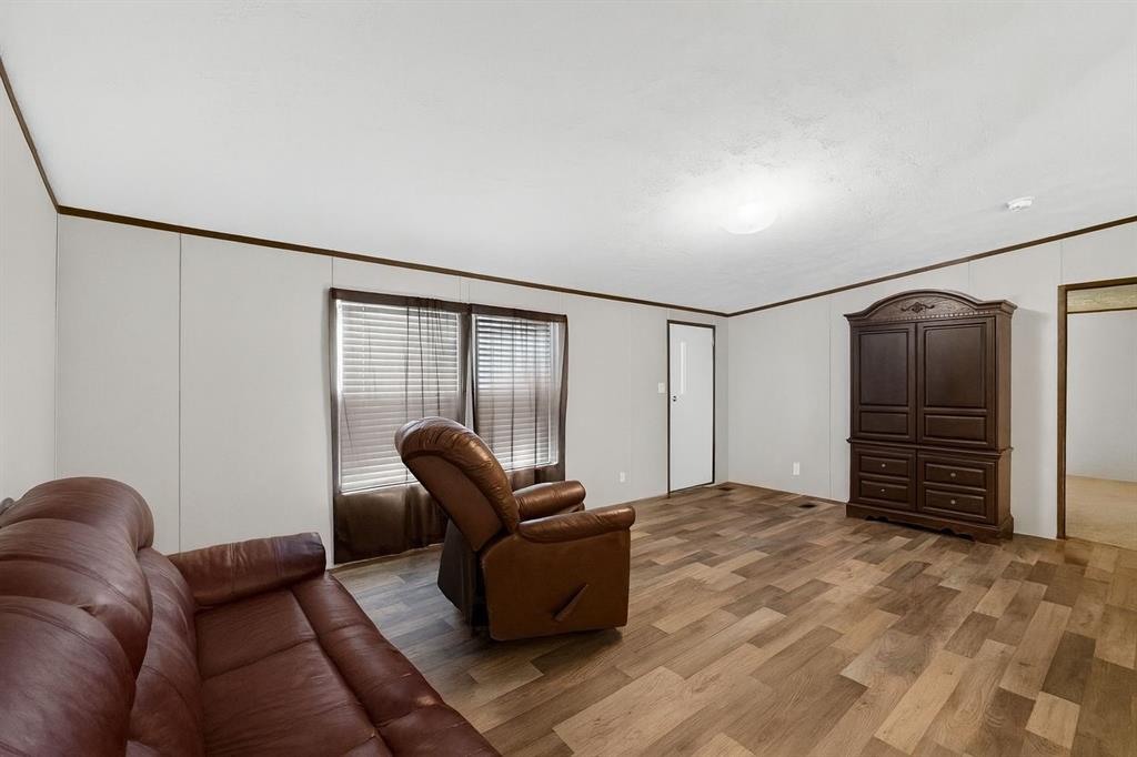 7219 Rucker Street Azle, TX 76020 - Photo 5 of 16 a living room with furniture