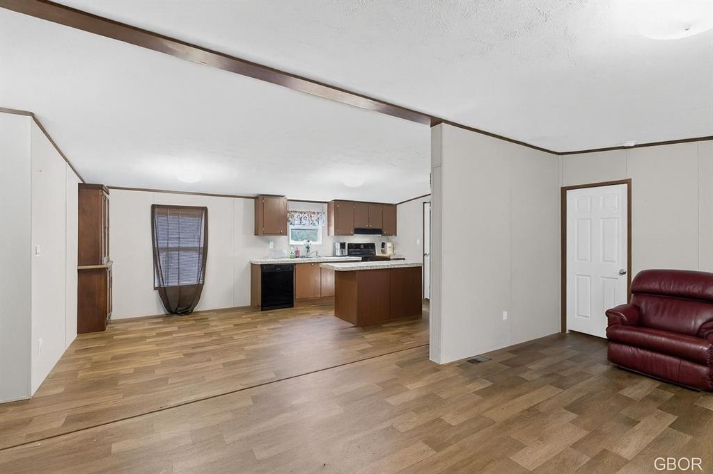 7219 Rucker Street Azle, TX 76020 - Photo 6 of 16 a bedroom with furniture and window