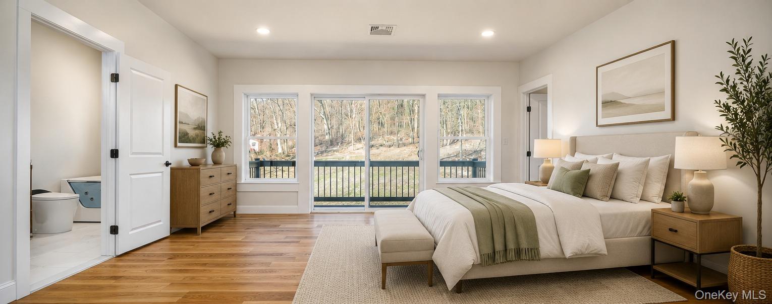 133 West Mombasha Road Monroe, NY 10950 - Photo 26 of 47 a bedroom with a large bed and a view of bedroom