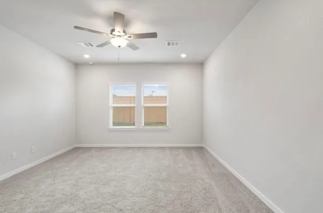 a bathroom with a shower and a sink