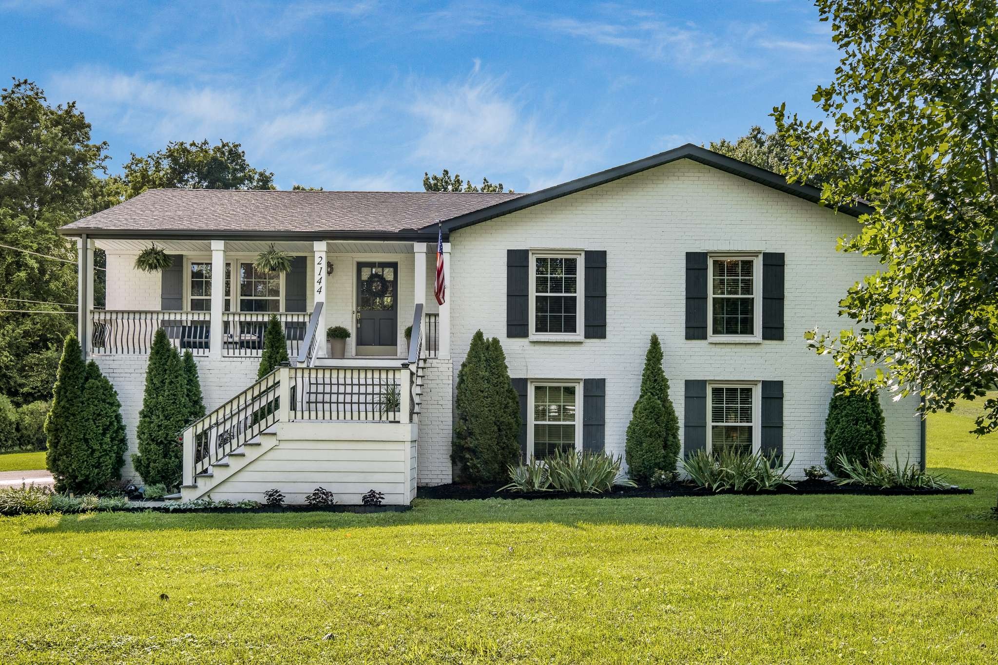 a view of a house with a swimming pool