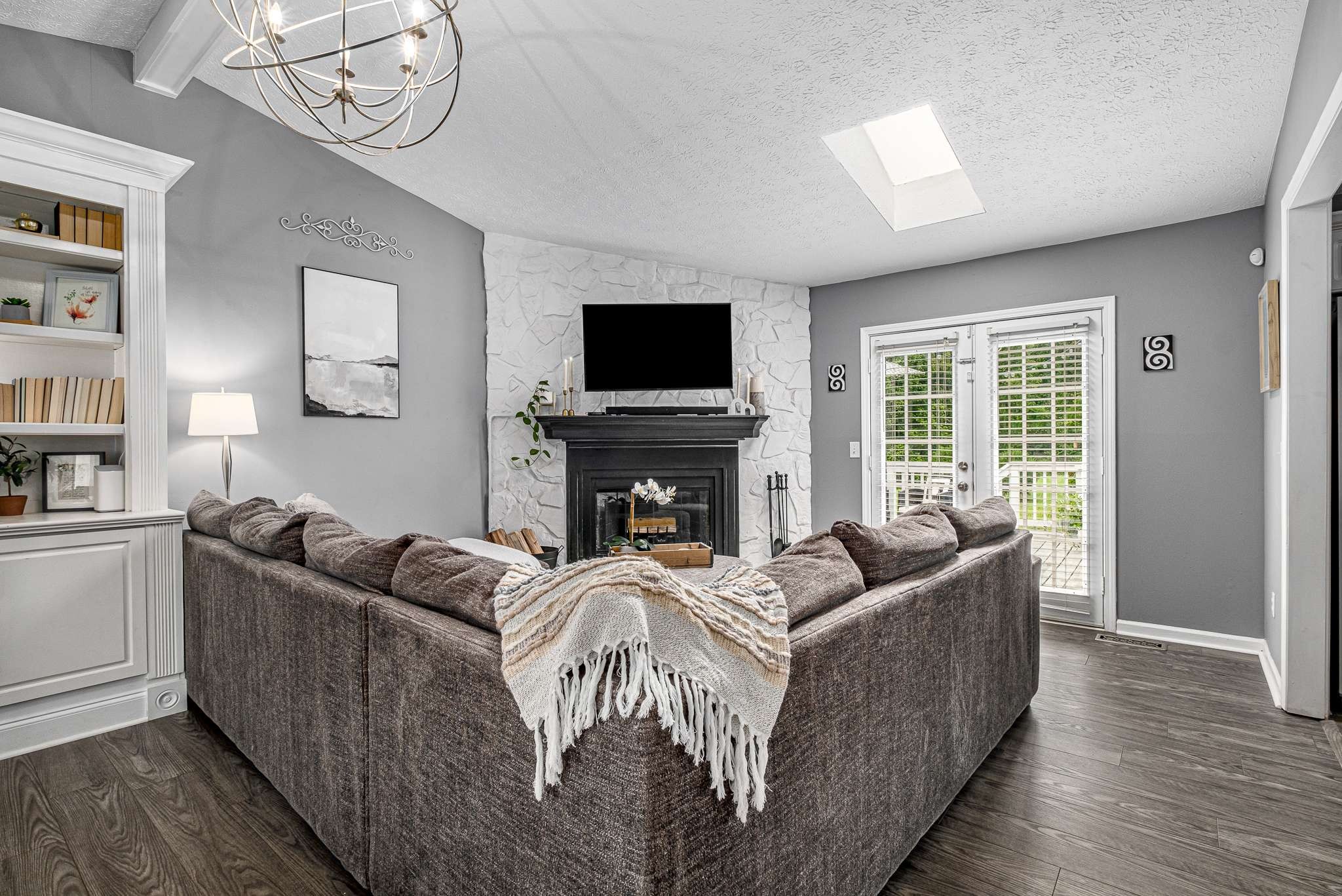 2144 Osburn Road Arrington, TN 37014 - Photo 19 of 51 a living room with furniture a flat screen tv and a fireplace