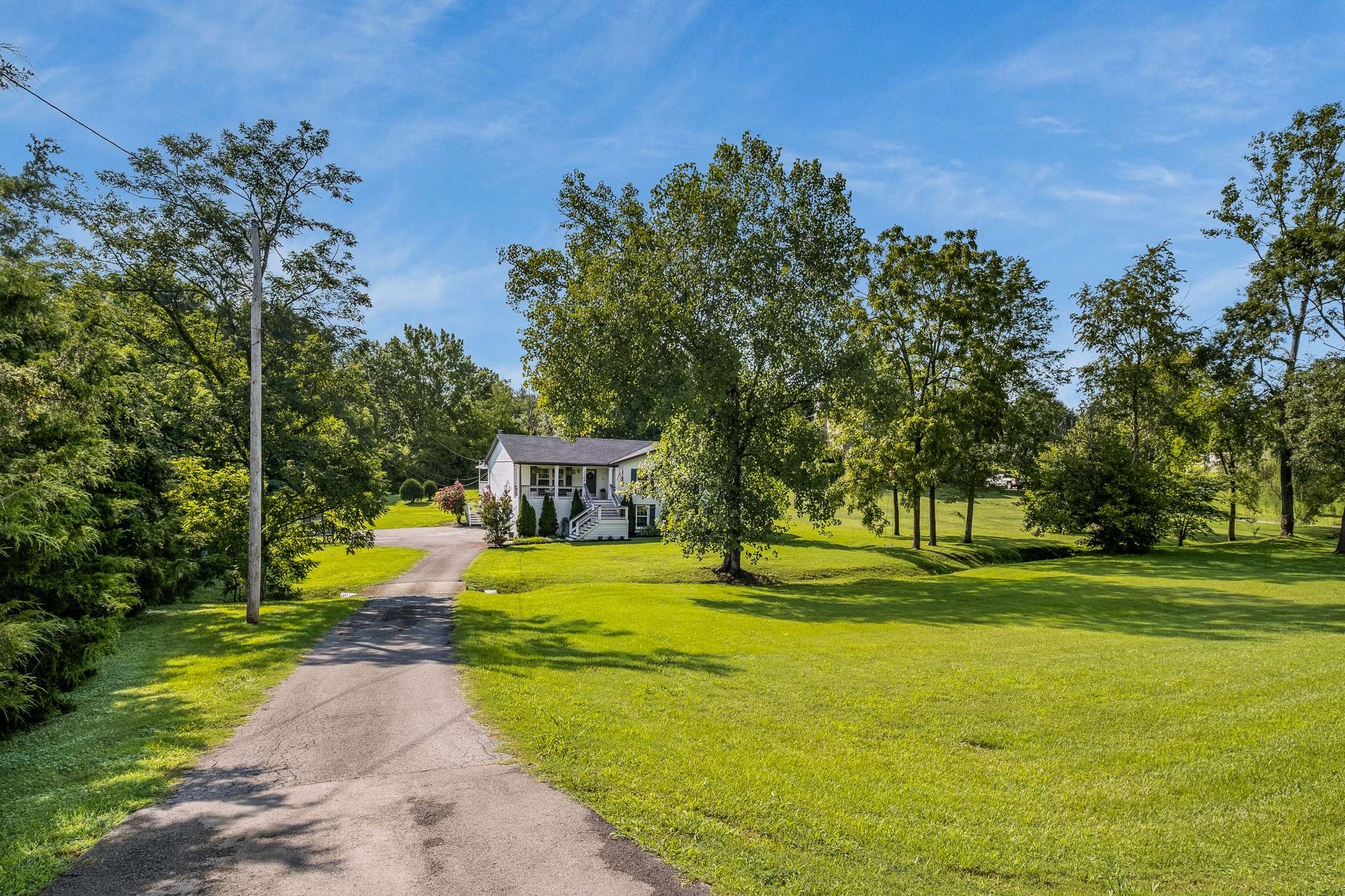 2144 Osburn Road Arrington, TN 37014 - Photo 3 of 51 a front view of a house with a yard