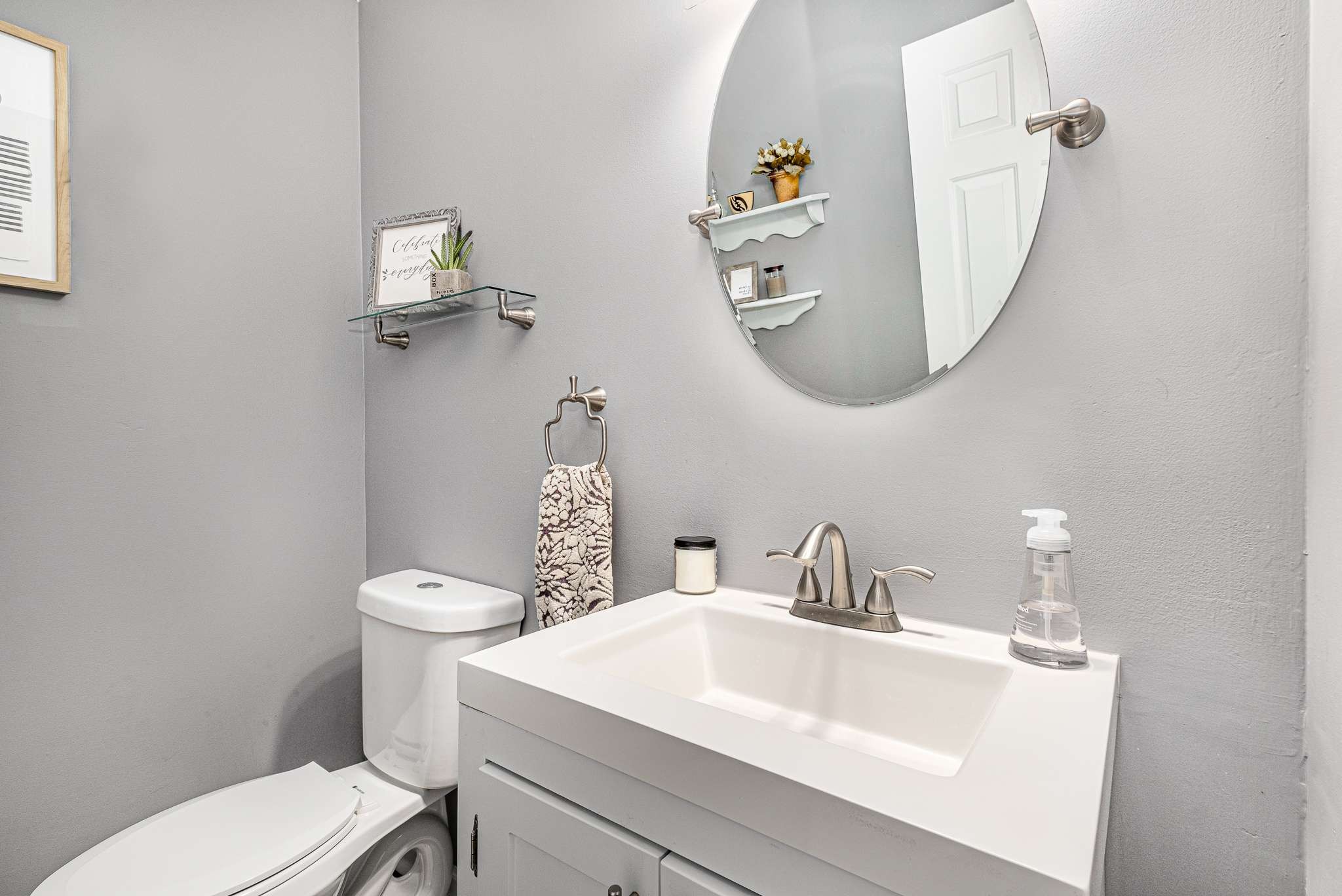 2144 Osburn Road Arrington, TN 37014 - Photo 31 of 51 a bathroom with a sink a mirror and toilet