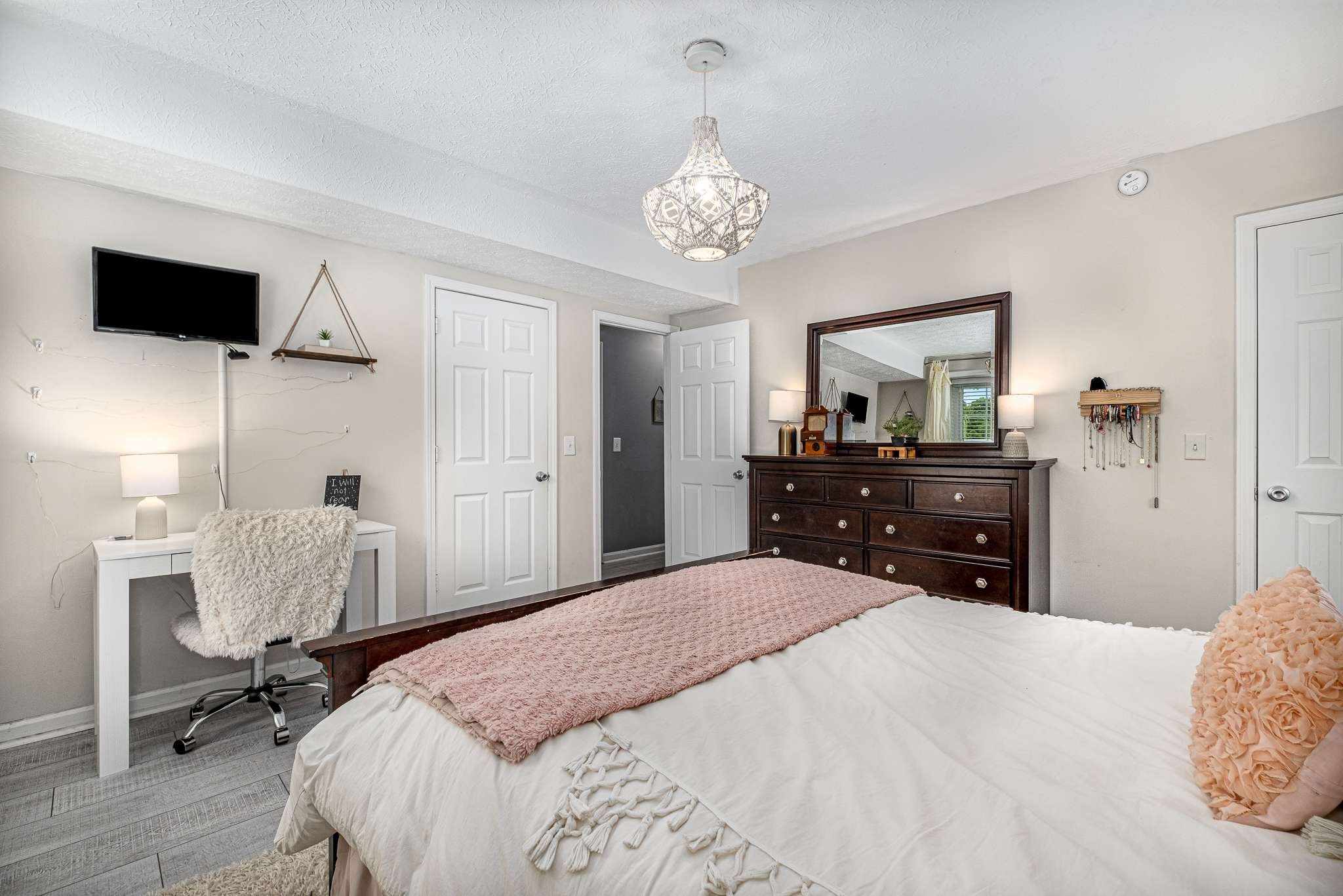 2144 Osburn Road Arrington, TN 37014 - Photo 34 of 51 a bedroom with a bed and a flat screen tv