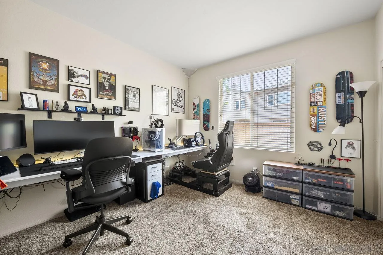 2928 Burnet Drive Escondido, CA 92027 - Photo 12 of 39 a view of a livingroom with workspace and a window