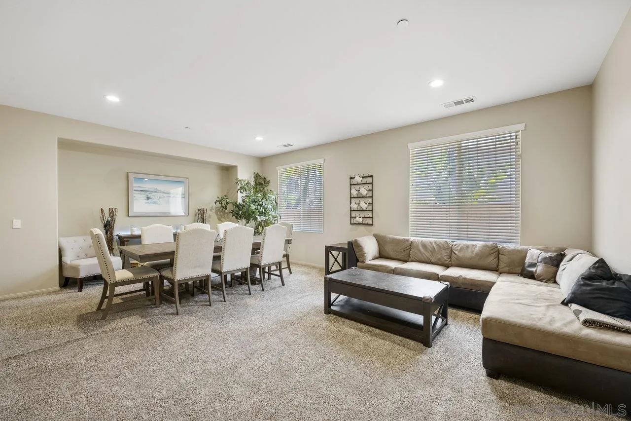 2928 Burnet Drive Escondido, CA 92027 - Photo 23 of 39 a living room with furniture and a large window