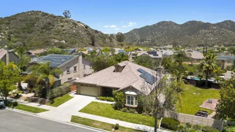 a view of a house with a mountain in it