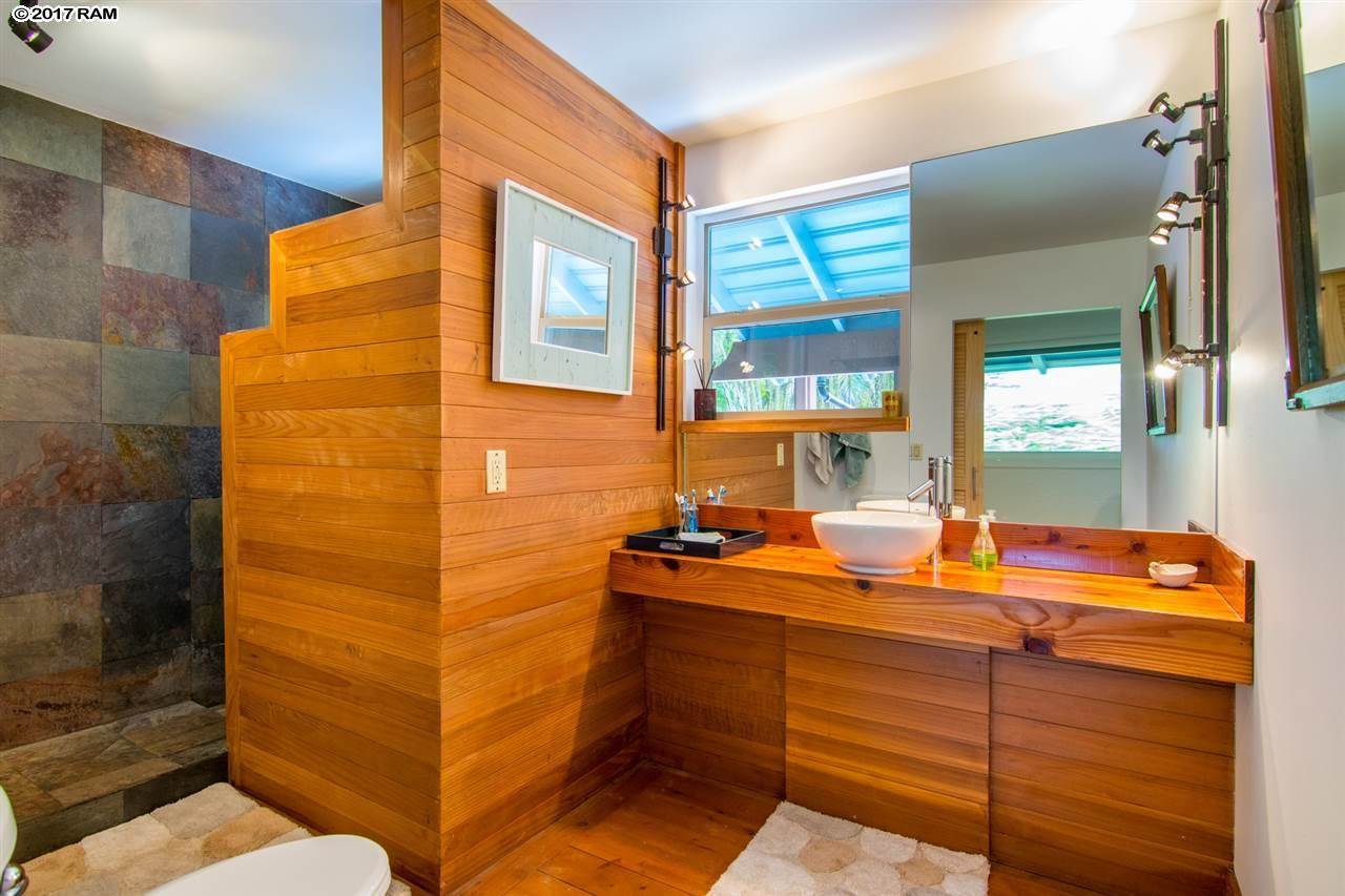 690 East Kuiaha Road Haiku, HI 96708 - Photo 17 of 30 a bathroom with a sink and a mirror