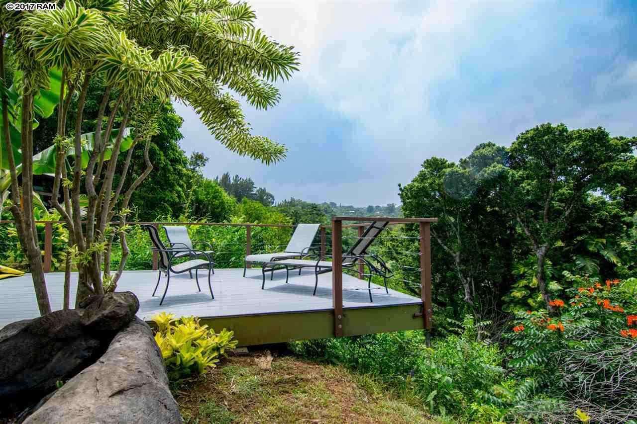 690 East Kuiaha Road Haiku, HI 96708 - Photo 24 of 30 a view of a swimming pool with a patio