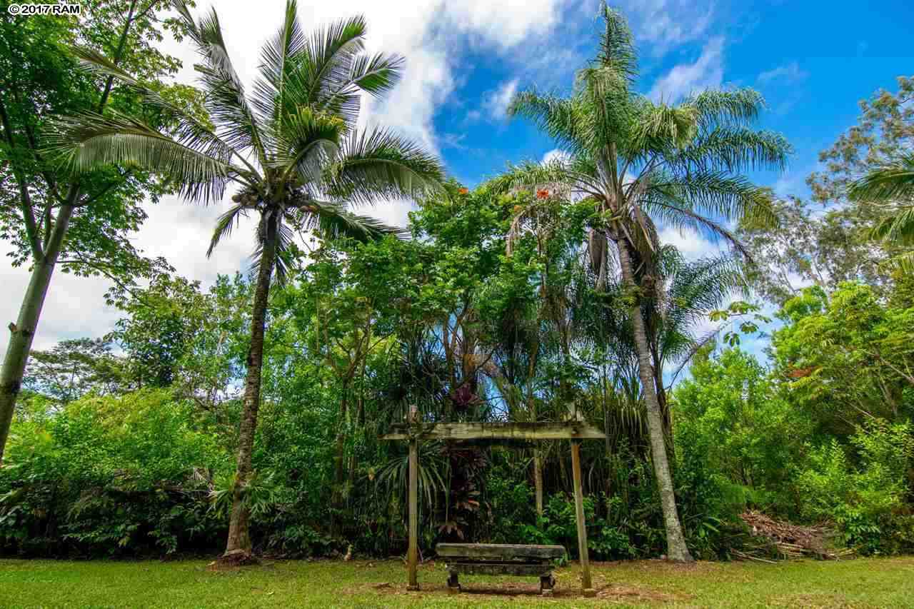 690 East Kuiaha Road Haiku, HI 96708 - Photo 26 of 30 a view of a building with a tree