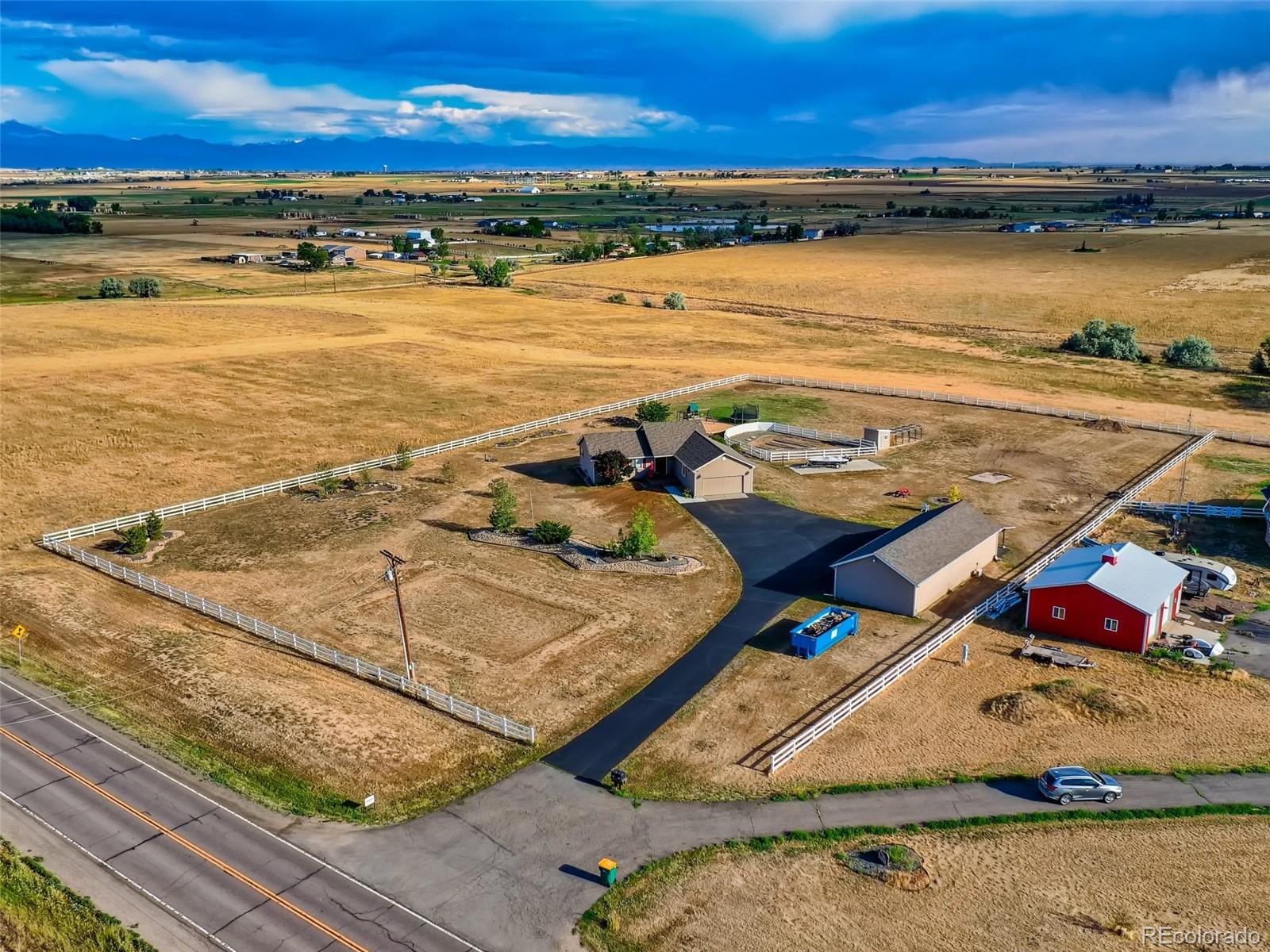 8209 County Road 2 Brighton, CO 80603 - Photo 2 of 40 a view of a room with an ocean view