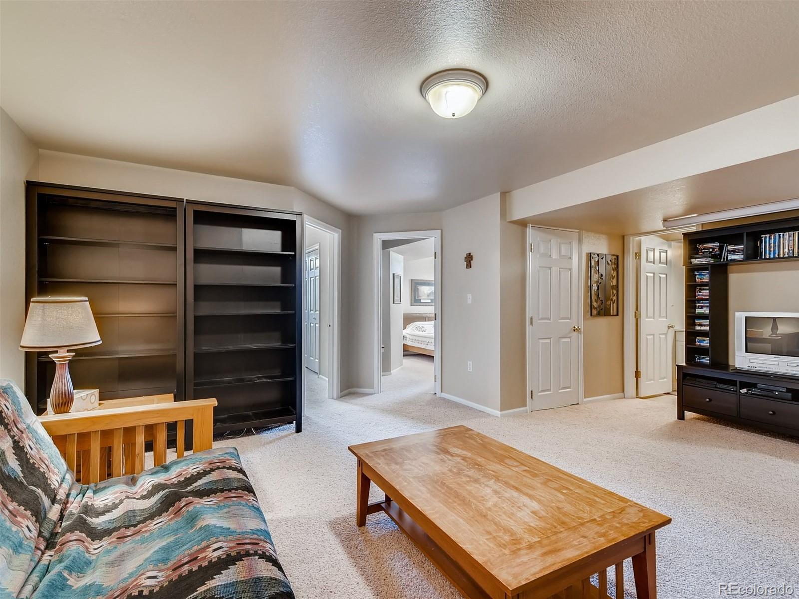 8209 County Road 2 Brighton, CO 80603 - Photo 29 of 40 a living room with furniture