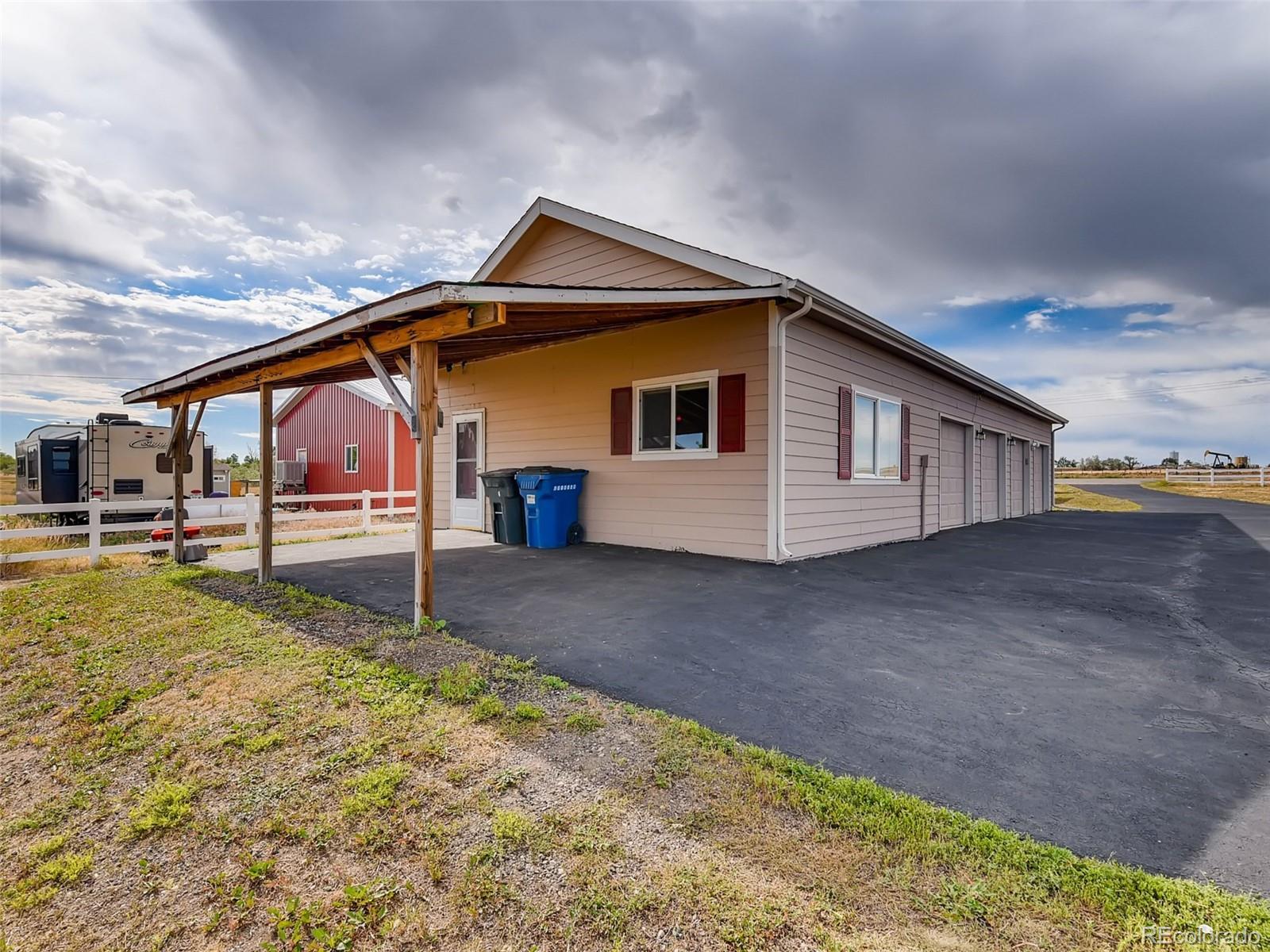 8209 County Road 2 Brighton, CO 80603 - Photo 34 of 40 a house view with a backyard space