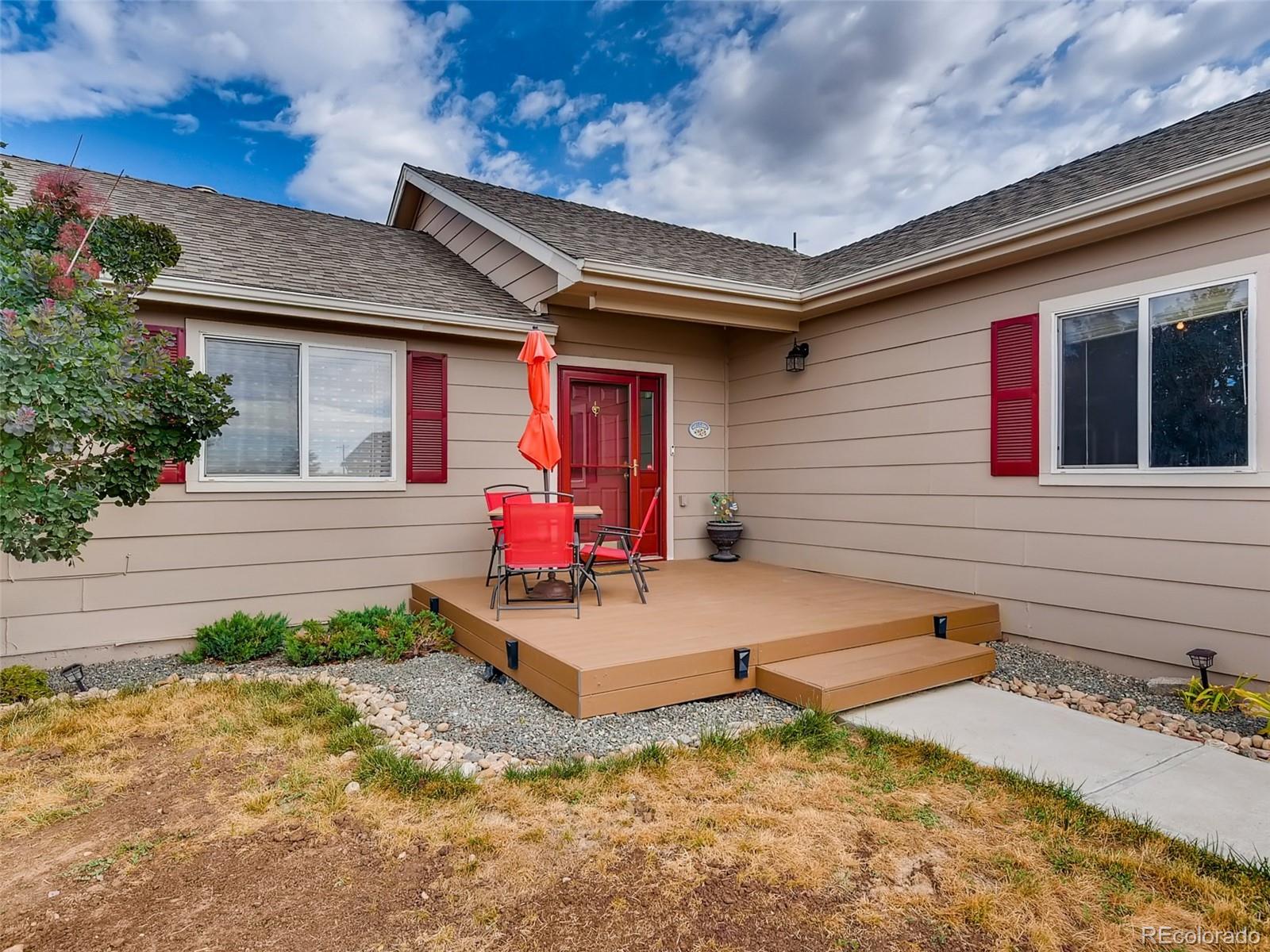 8209 County Road 2 Brighton, CO 80603 - Photo 5 of 40 a view of a house with a patio