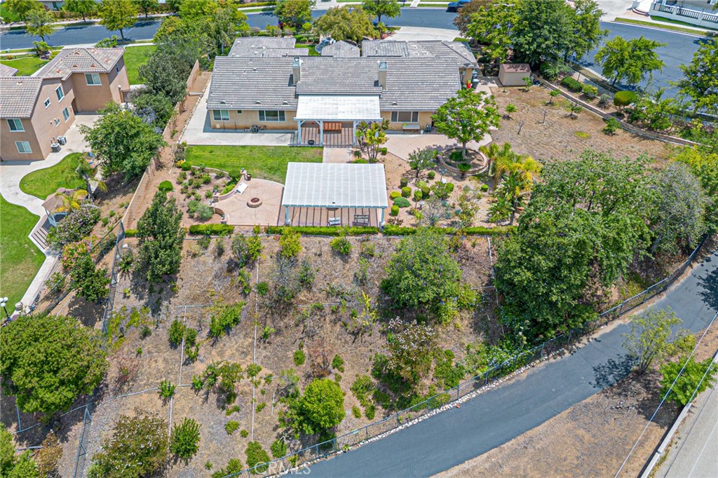 4088 Shady Ridge Circle Corona, CA 92881 - Photo 45 of 47 an aerial view of a house with a yard and garden