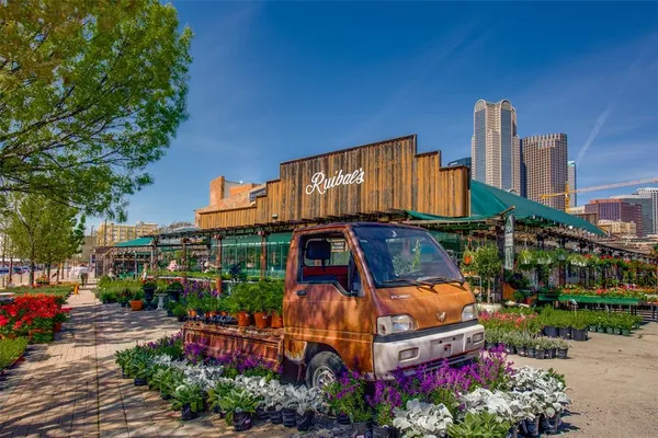 an outdoor view of a building with garden