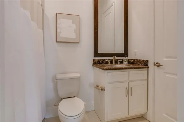 a bathroom with a toilet