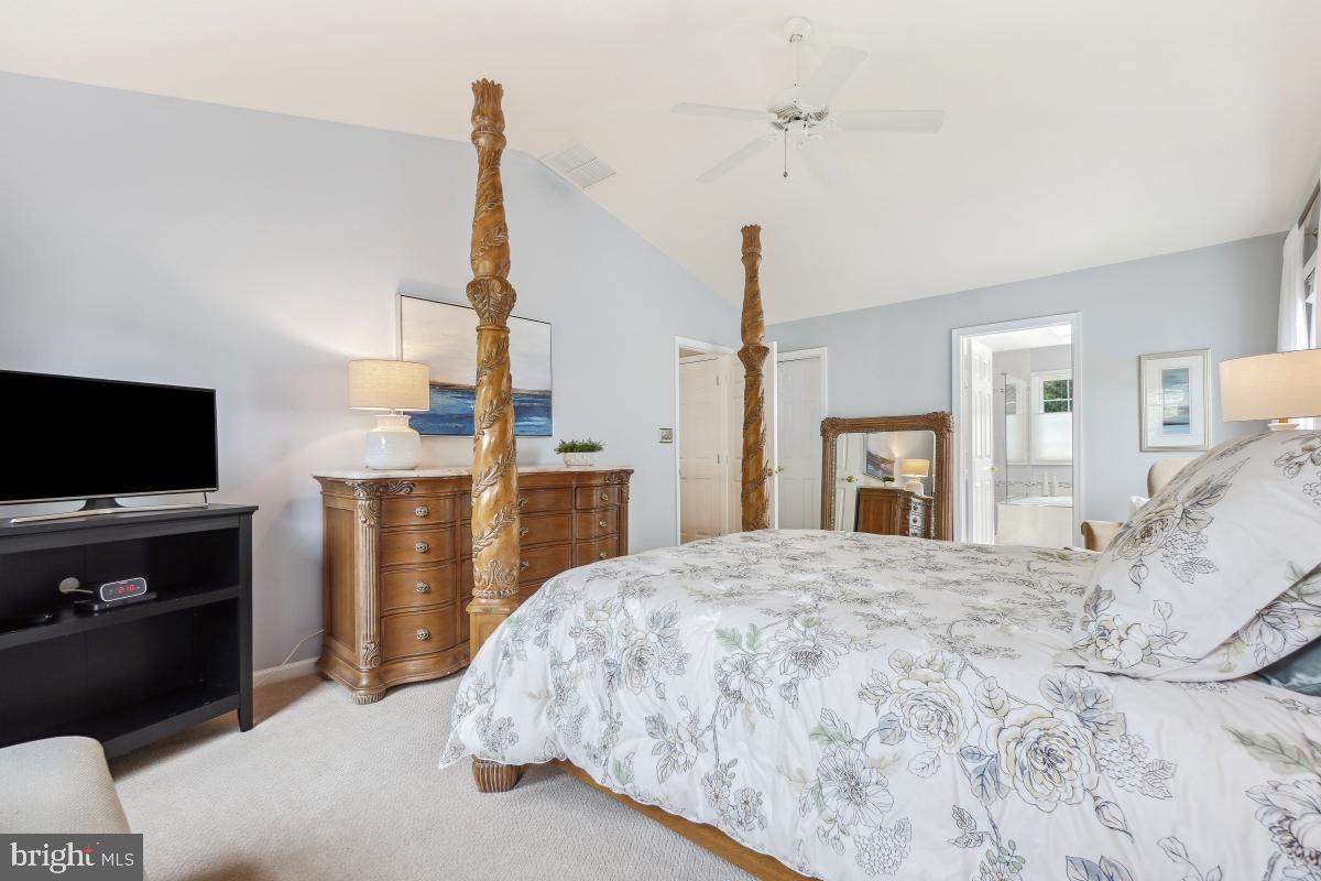 20479 Quarterpath Trace Circle Sterling, VA 20165 - Photo 25 of 41 a bedroom with a bed and flat screen tv