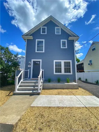 a view of outdoor space yard and front view of a house