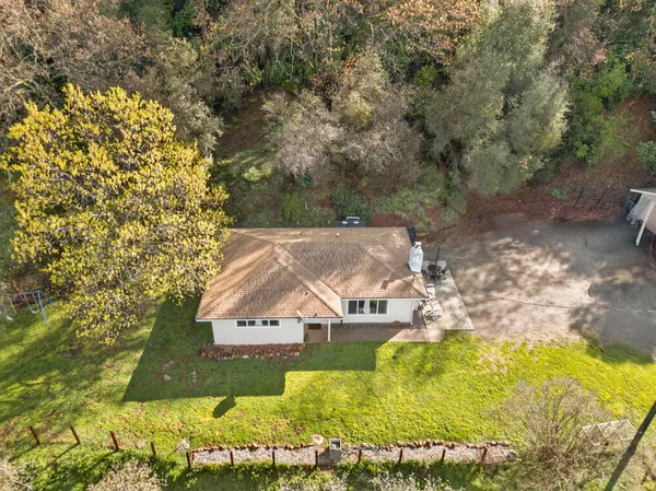 a view of swimming pool with a yard