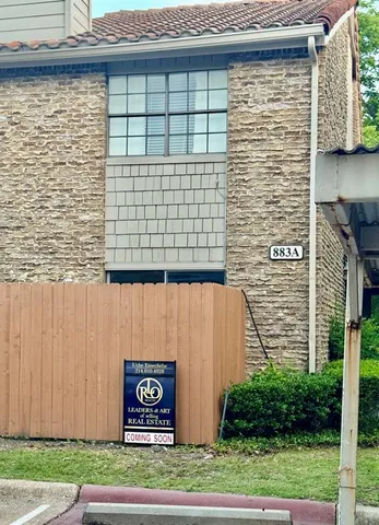 a sign on the side of a building