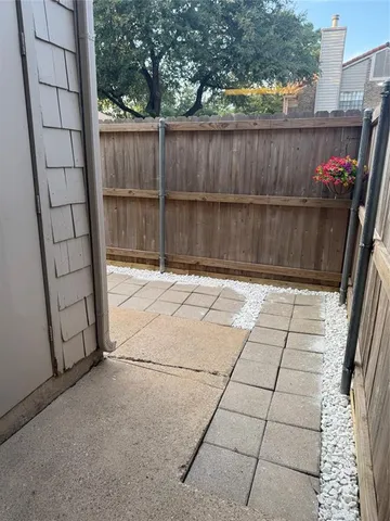 a view of outdoor space and wooden deck