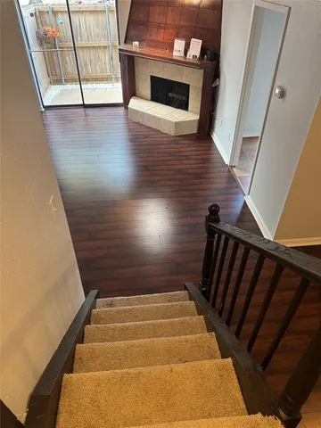 a view of entryway with wooden floor