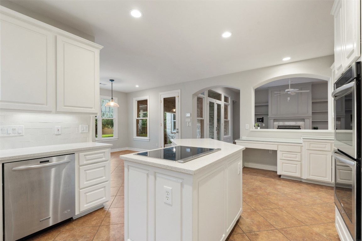 127 Roberts Circle Georgetown, TX 78633 - Photo 17 of 35 a kitchen with white cabinets appliances and sink