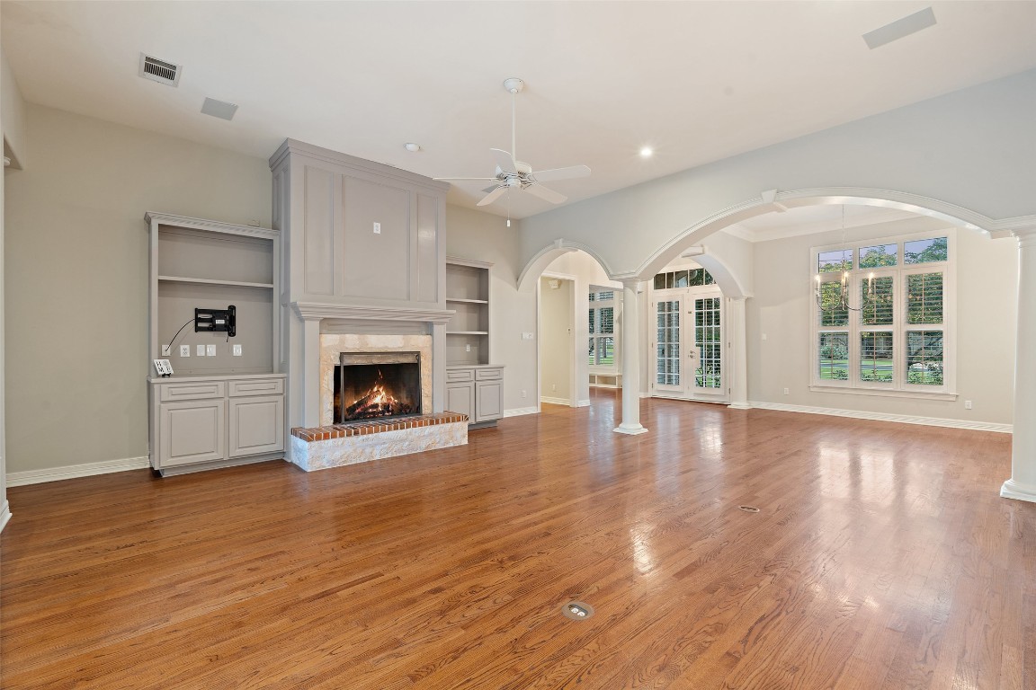 127 Roberts Circle Georgetown, TX 78633 - Photo 19 of 35 a view of empty room with wooden floor and fireplace