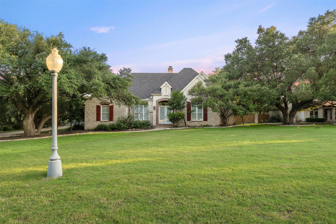 127 Roberts Circle Georgetown, TX 78633 - Photo 2 of 35 a front view of a house with garden