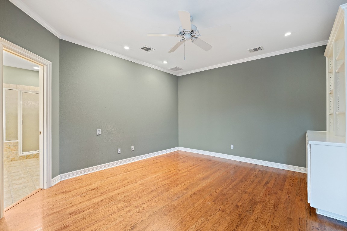 127 Roberts Circle Georgetown, TX 78633 - Photo 21 of 35 a view of empty room with wooden floor