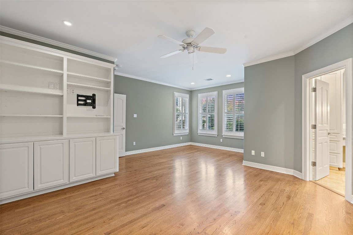 127 Roberts Circle Georgetown, TX 78633 - Photo 22 of 35 a view of an empty room with a window and wooden floor
