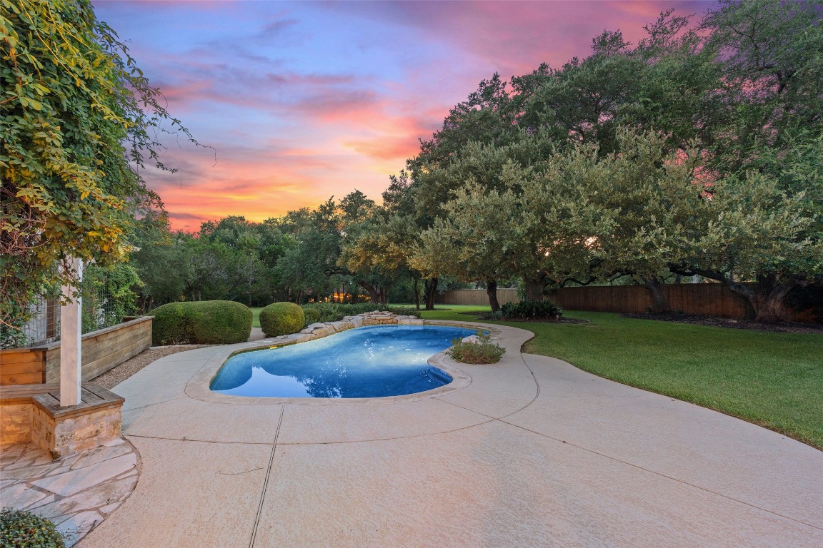 127 Roberts Circle Georgetown, TX 78633 - Photo 32 of 35 a view of swimming pool with a garden and slide
