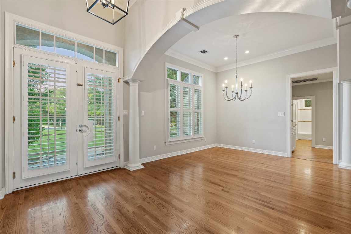 127 Roberts Circle Georgetown, TX 78633 - Photo 7 of 35 a view of an empty room with wooden floor and a window
