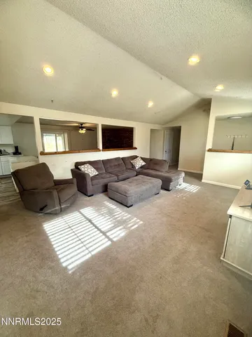 a view of kitchen with furniture and window