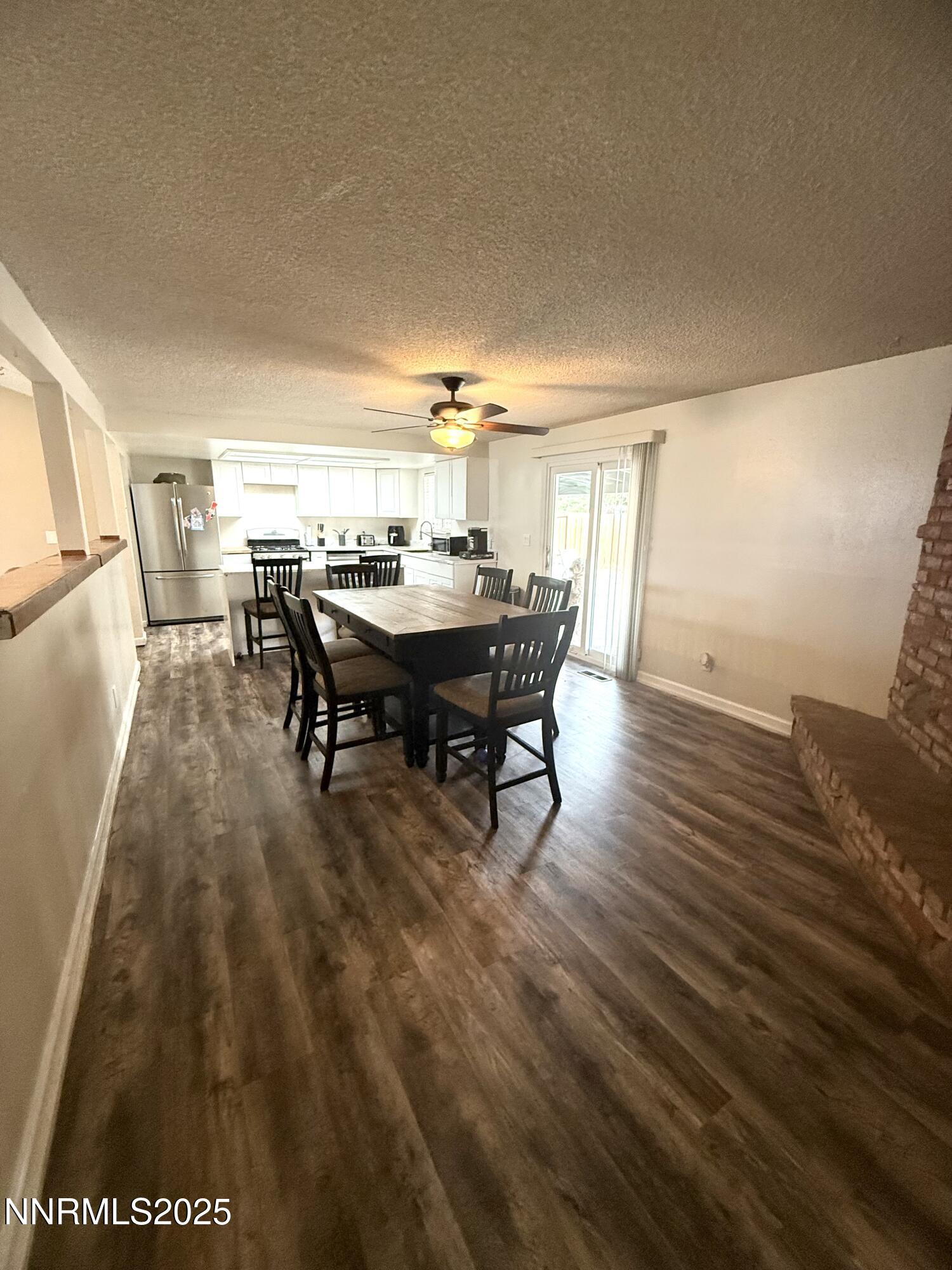 2775 Vicky Lane Minden, NV 89423 - Photo 5 of 6 a view of a dining room with furniture and window