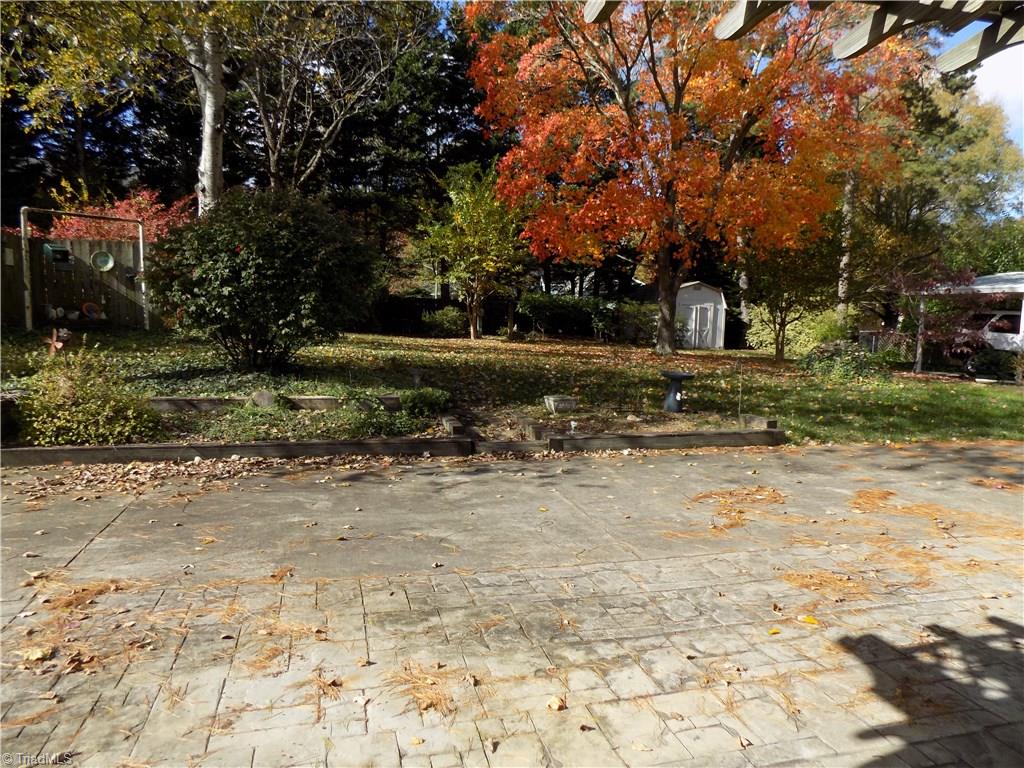 3413 Pine Valley Road High Point, NC 27265 - Photo 22 of 26 Backyard/patio/storage bldg.
