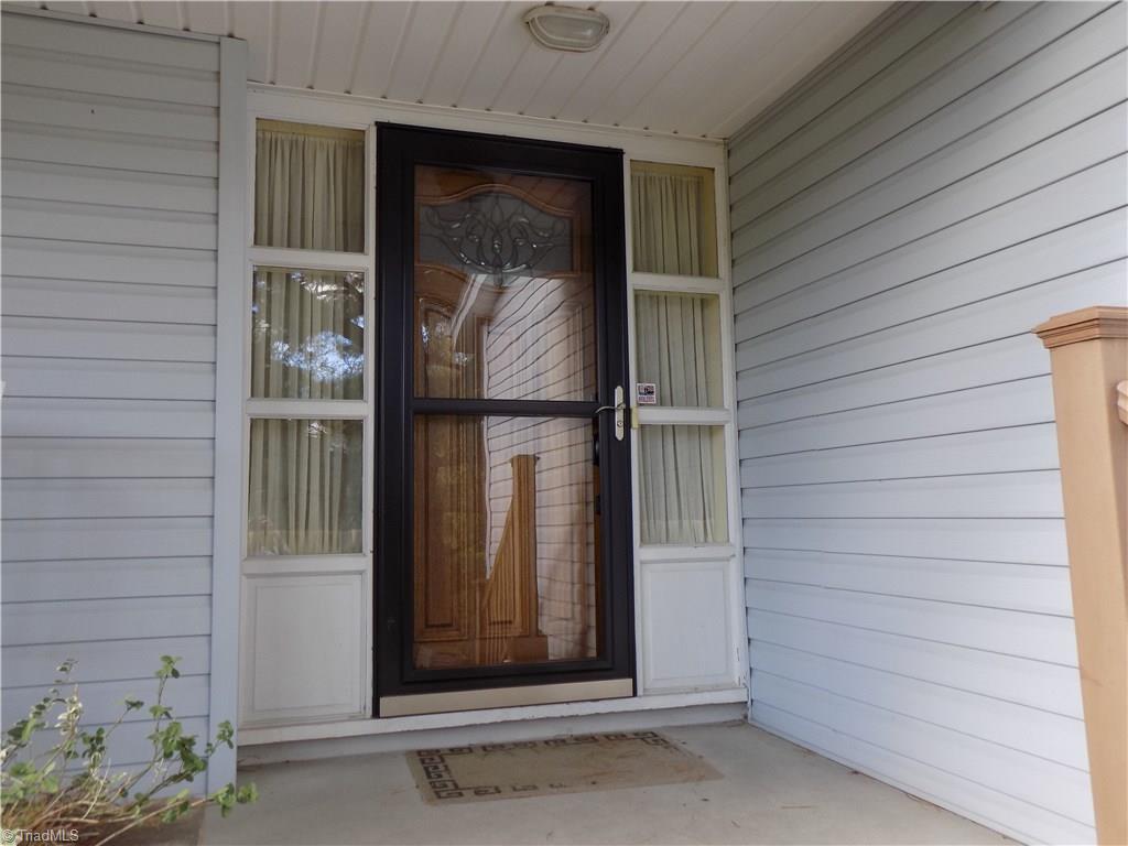 3413 Pine Valley Road High Point, NC 27265 - Photo 6 of 26 Beautiful front door with storm door