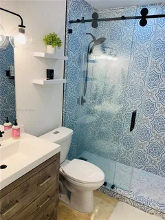 $675,000 | 6815 Edgewater Drive, Unit 105, Coral Gables, FL 33133