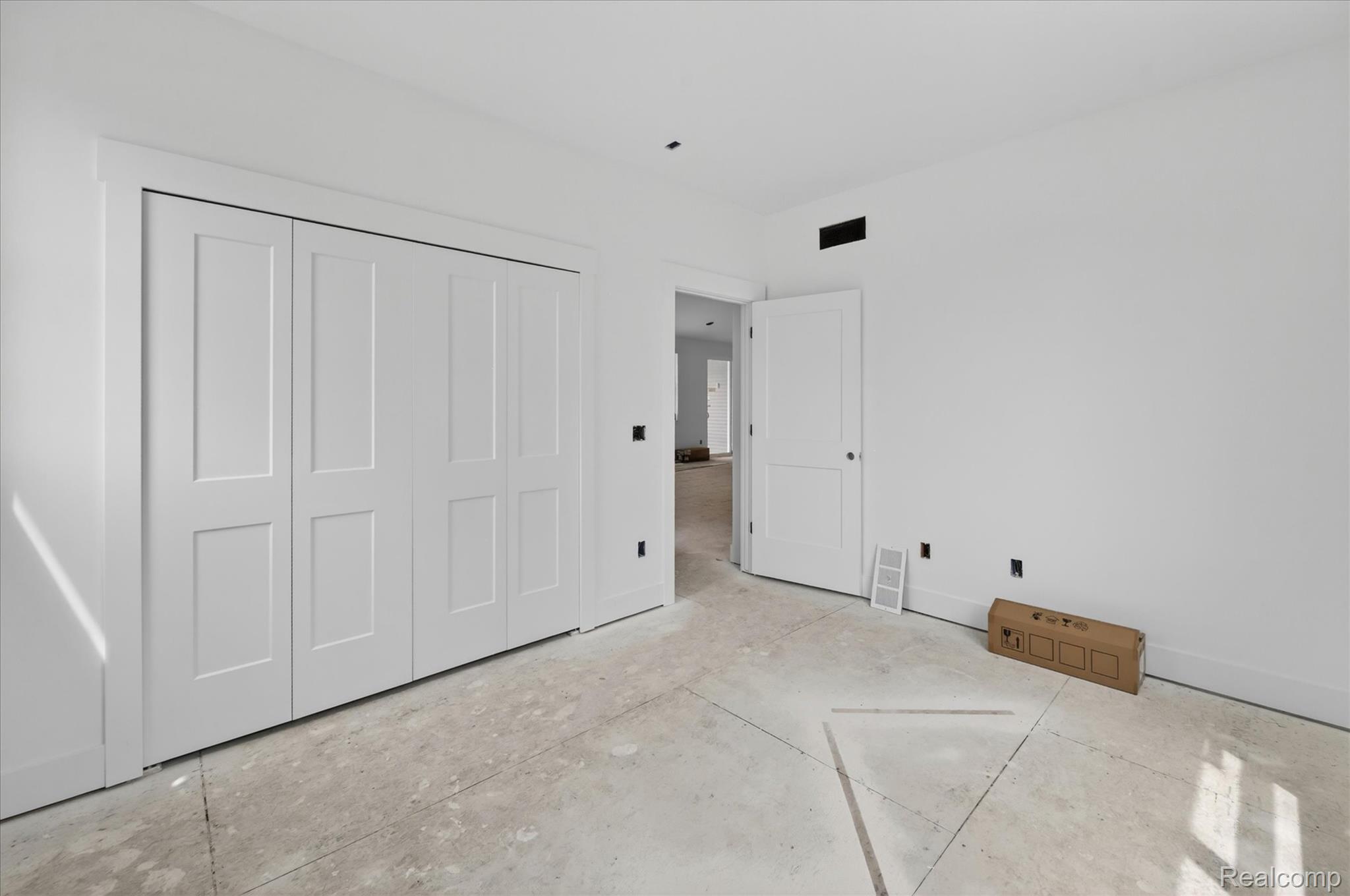 3297 Oak Grove Road Howell, MI 48855 - Photo 12 of 40 Bedroom with spacious closet and convenient access to the main living areas.