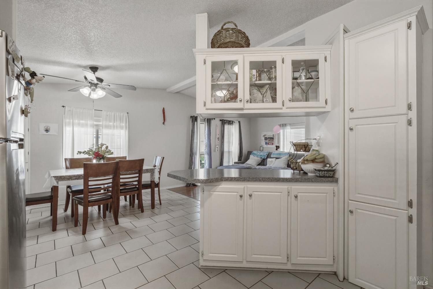 436 McCoy Avenue Santa Rosa, CA 95407 - Photo 12 of 27 a view of a dining room with furniture and chandelier